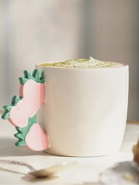 Anthropologie Skylar Stoneware Mug with Pink Green Strawberry Handle